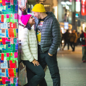 Couple standing outside of Tokyo Vending machine